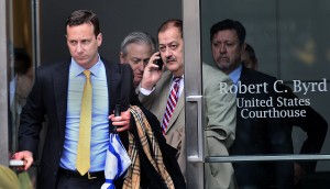 F. BRIAN FERGUSON | Gazette-Mail Don Blankenship, center, and his legal team exit the Robert C. Byrd Courthouse during Tuesday's lunch break.