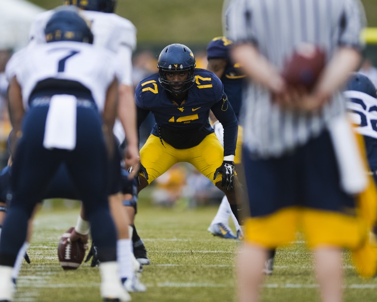 Middle linebacker Al-Rasheed Benton (17) sizes up the play before the snap. I said it before, and I'll say it again: He's frightening.