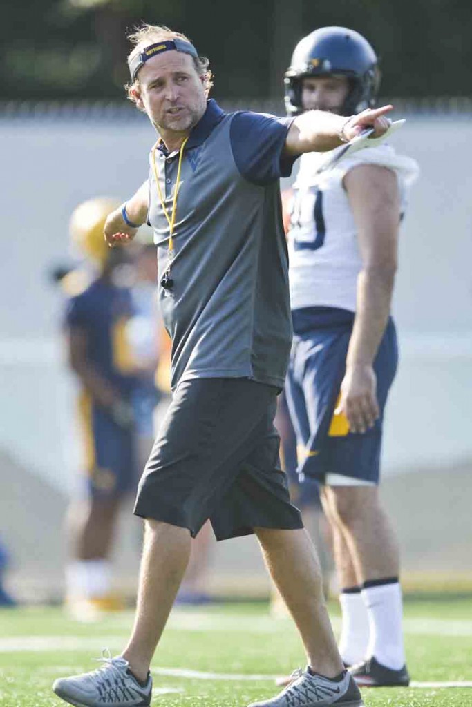 CHRISTIAN TYLER RANDOLPH | Gazette-Mail Photos WVU Head Coach Dana Holgorsen during open practice at the Steve Antoline Family Football Practice Field in Morgantown, W.Va. on Tuesday Aug. 02, 2016.